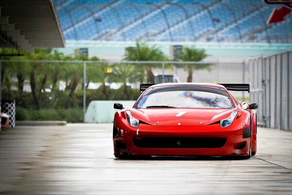 Red Ferrari with an eight-cylinder engine