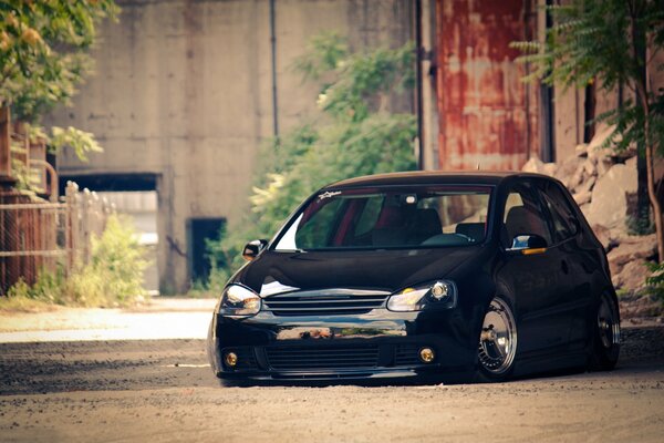 Beautiful black car on the construction site