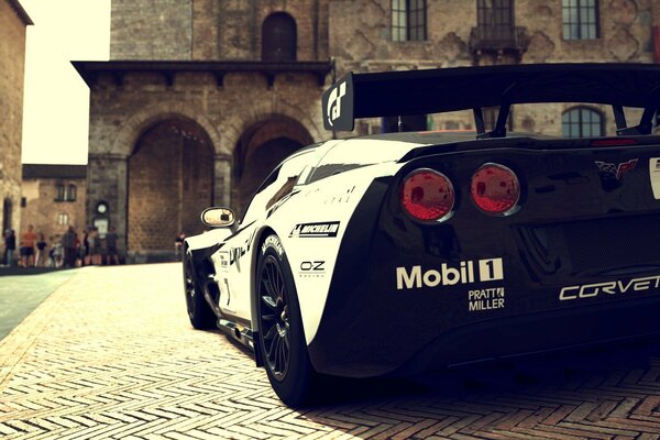 Chevrolet Corvette - black sports supercar, rear view