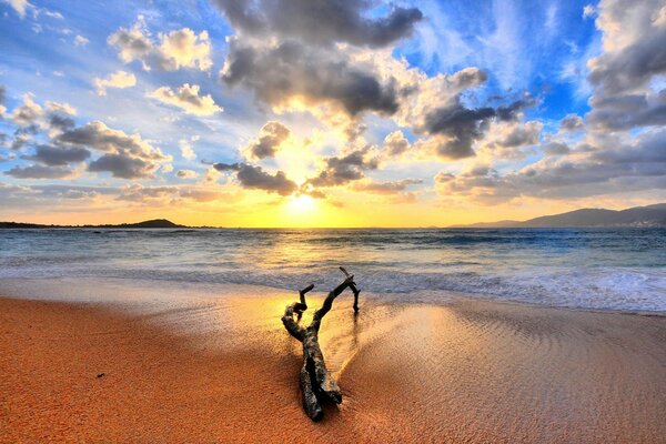 Relaxing by the sea lying on the sand