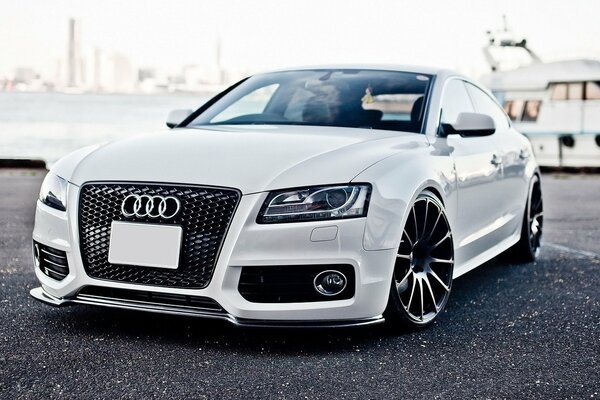 The front of the white Audi in a stylish perspective