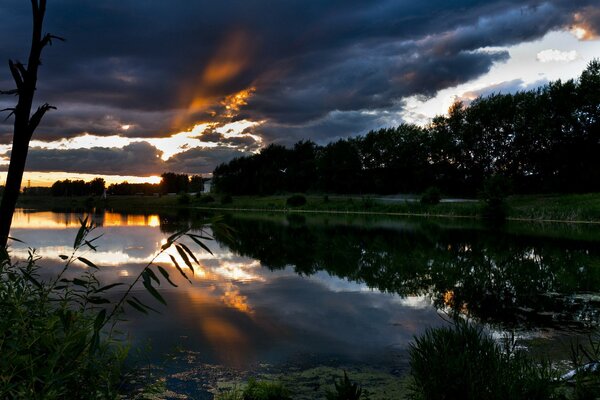 Thunderclouds over the lake in the evening