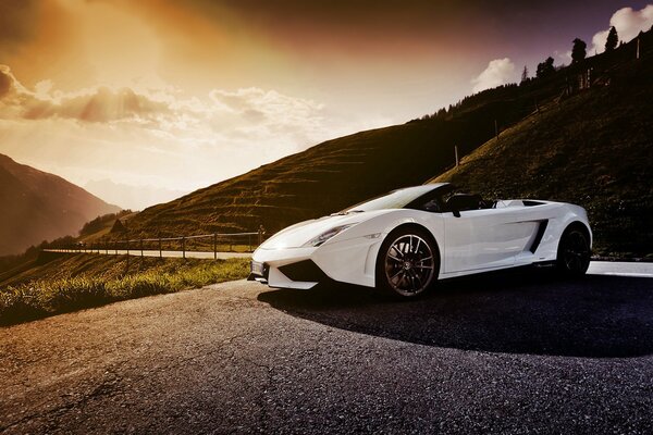 Lambogrini supercar in the middle of an empty road