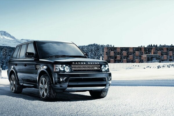 Range rover in winter under the sun