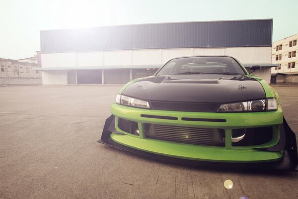 Green Nissan Silva in a distorted perspective