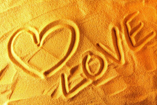 Declaration of love on golden sand