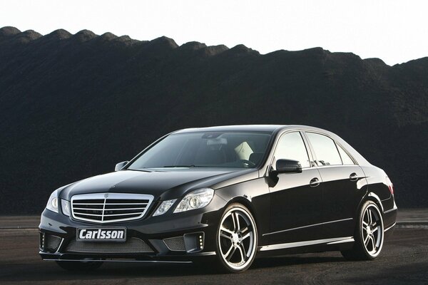 Black Mercedes with chrome wheels