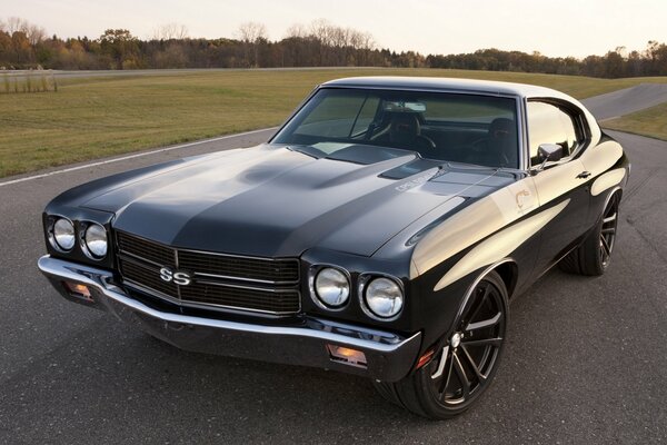 Classic Chevrolet muscle car on the road