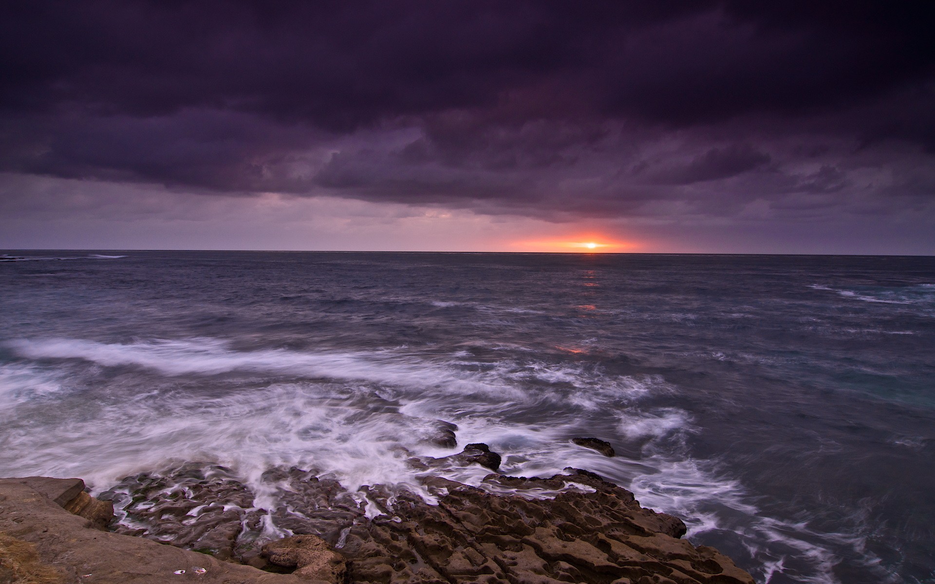 tramonto mare onde