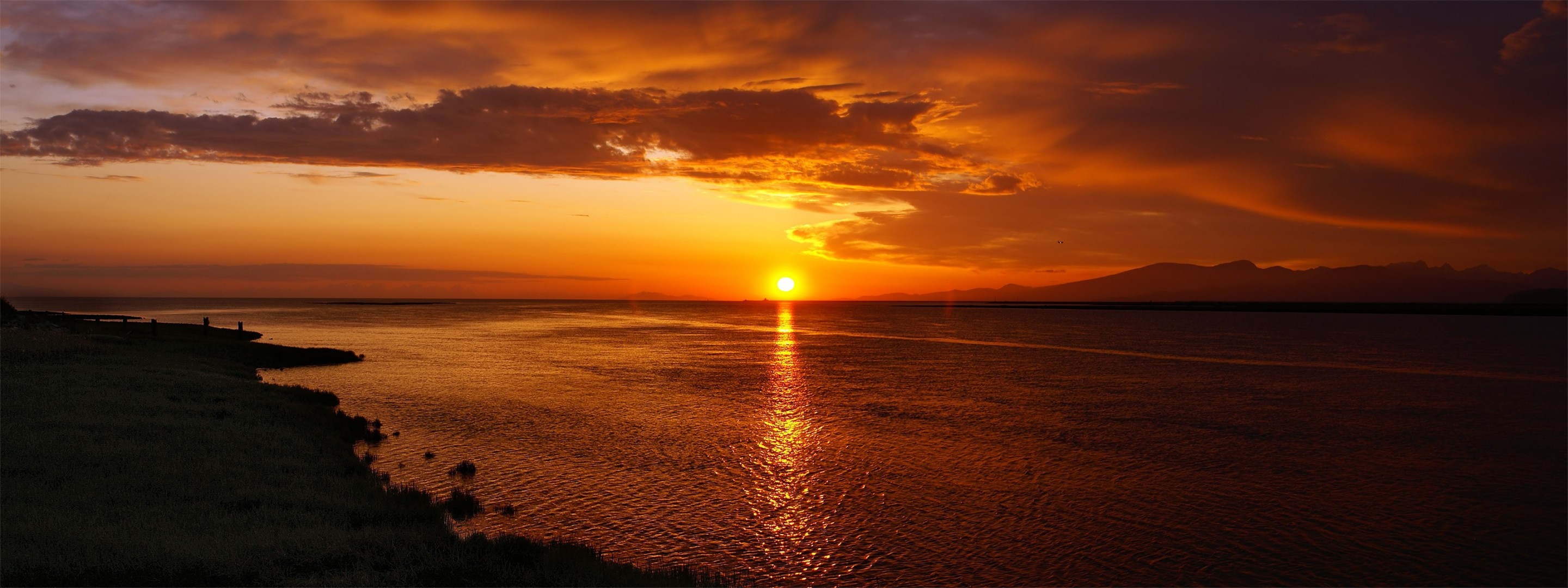 spiaggia tramonto cielo