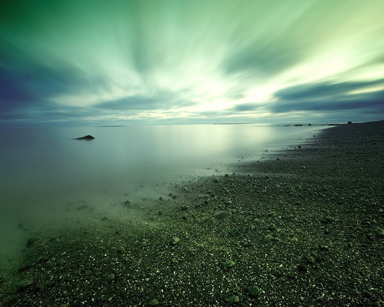 beach stones water cloud