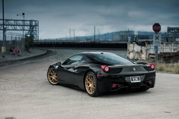 Fascinating Ferrari on the background of the railway