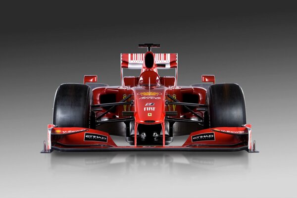 The Formula -1 sports ache is red on a gray background