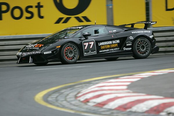 Lamborghini car at the turn of the race track