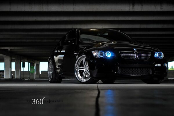 Black BMW M3 parked in the parking lot