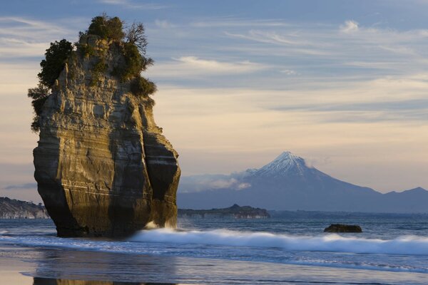 Mount Taranaki and light surf