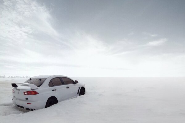 Mitsubishi lancer on the snowy steppes