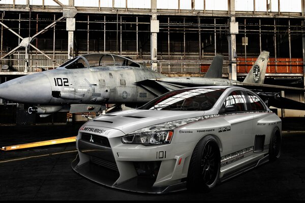 Mitsubishi lancer with combat fighter