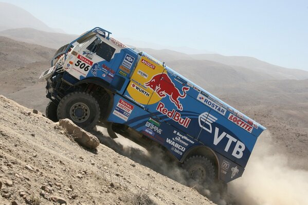 Blue KAMAZ in the dusty desert