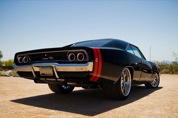 Black car on a desert background