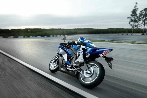 Racing motorcycle at speed on asphalt