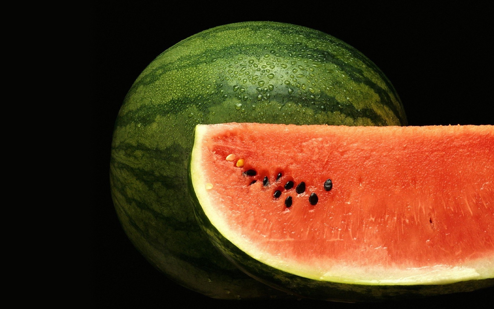 watermelon close up water droplets black background nature