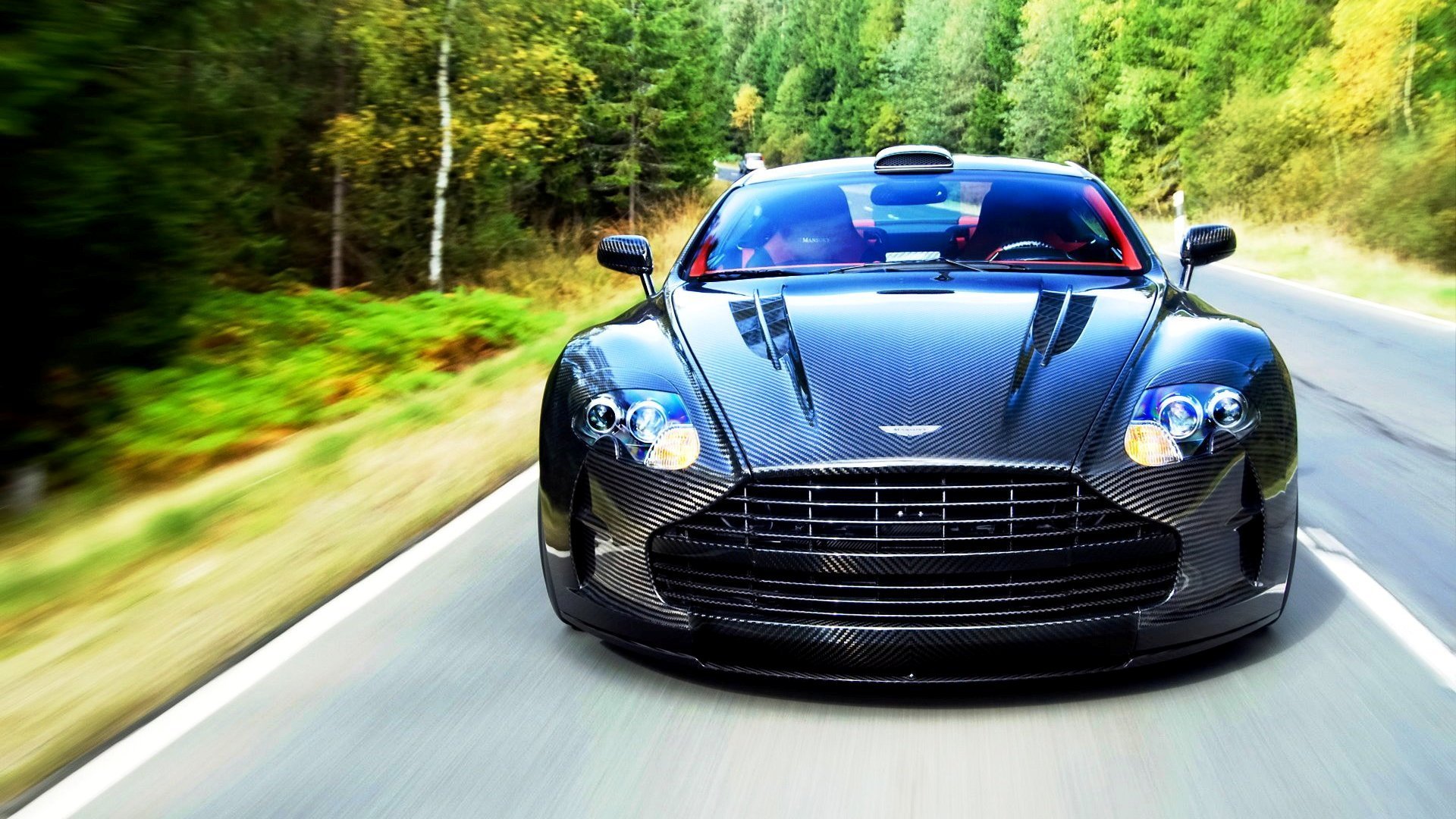 aston martin db9 or dbs carbon