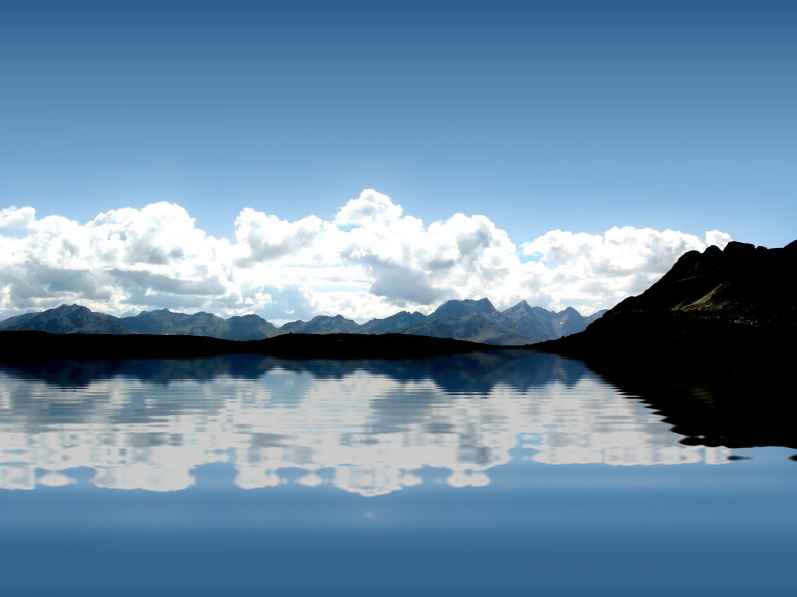 agua reflexión olas montañas nubes