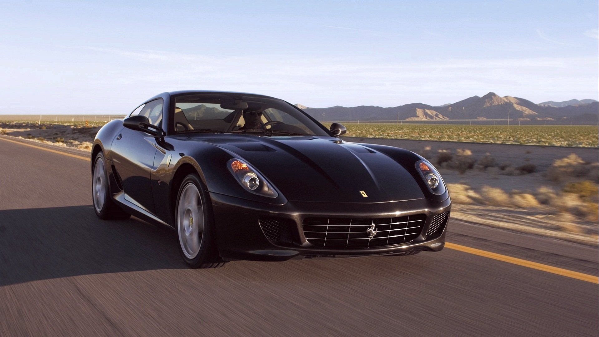 ferrari coche negro carretera