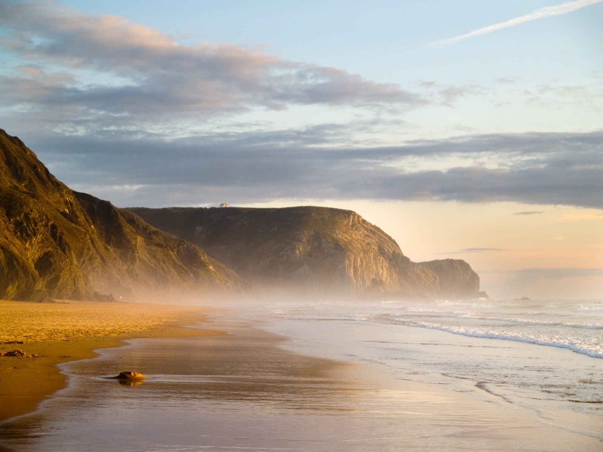 beach water sea hills sky