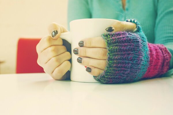 Drink a glass of tea and warm your hands