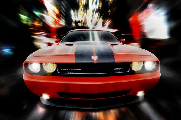 Voiture de sport rouge sur la piste de nuit