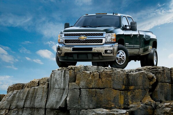 Chevrolet silverado on a rocky cliff