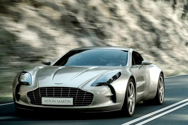 The Aston Martin car rushes at speed