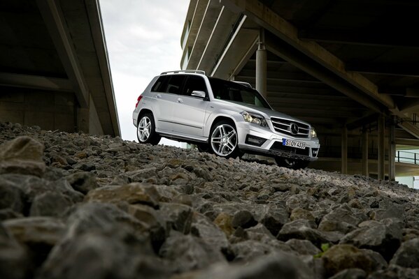 Mercedes Benz GLK250 on the background of the bridge