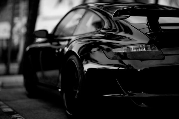 A beautiful black car in dark colors