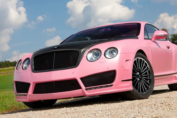 Pink bentley outdoors on a bright day