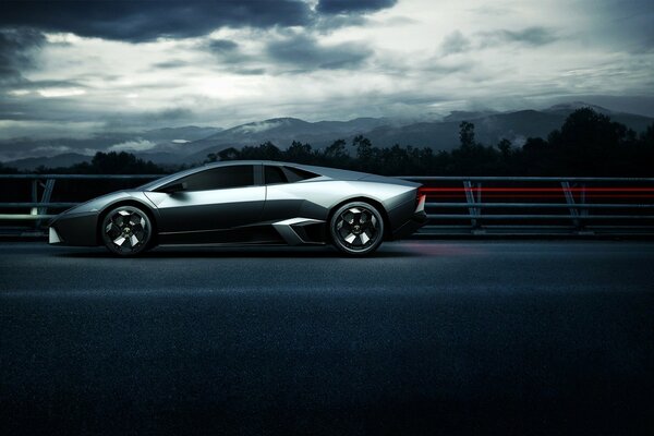 Silver Lamborghini on a gray sky background