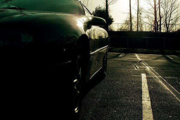 Car on the sports field black and white photo