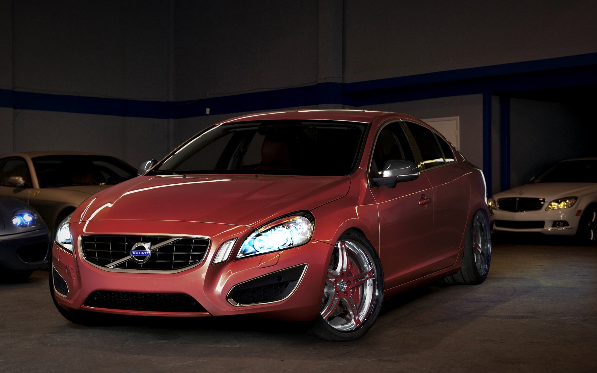 red volvo drives cla