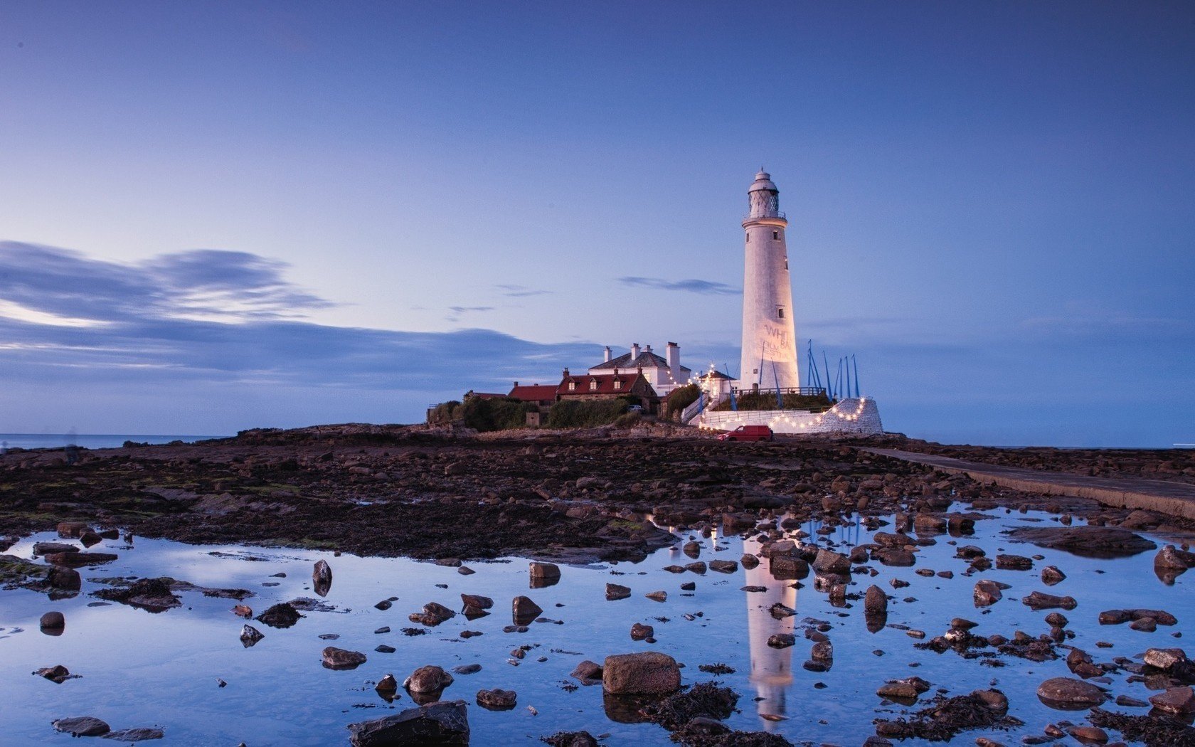 wasser steine leuchtturm meer dämmerung