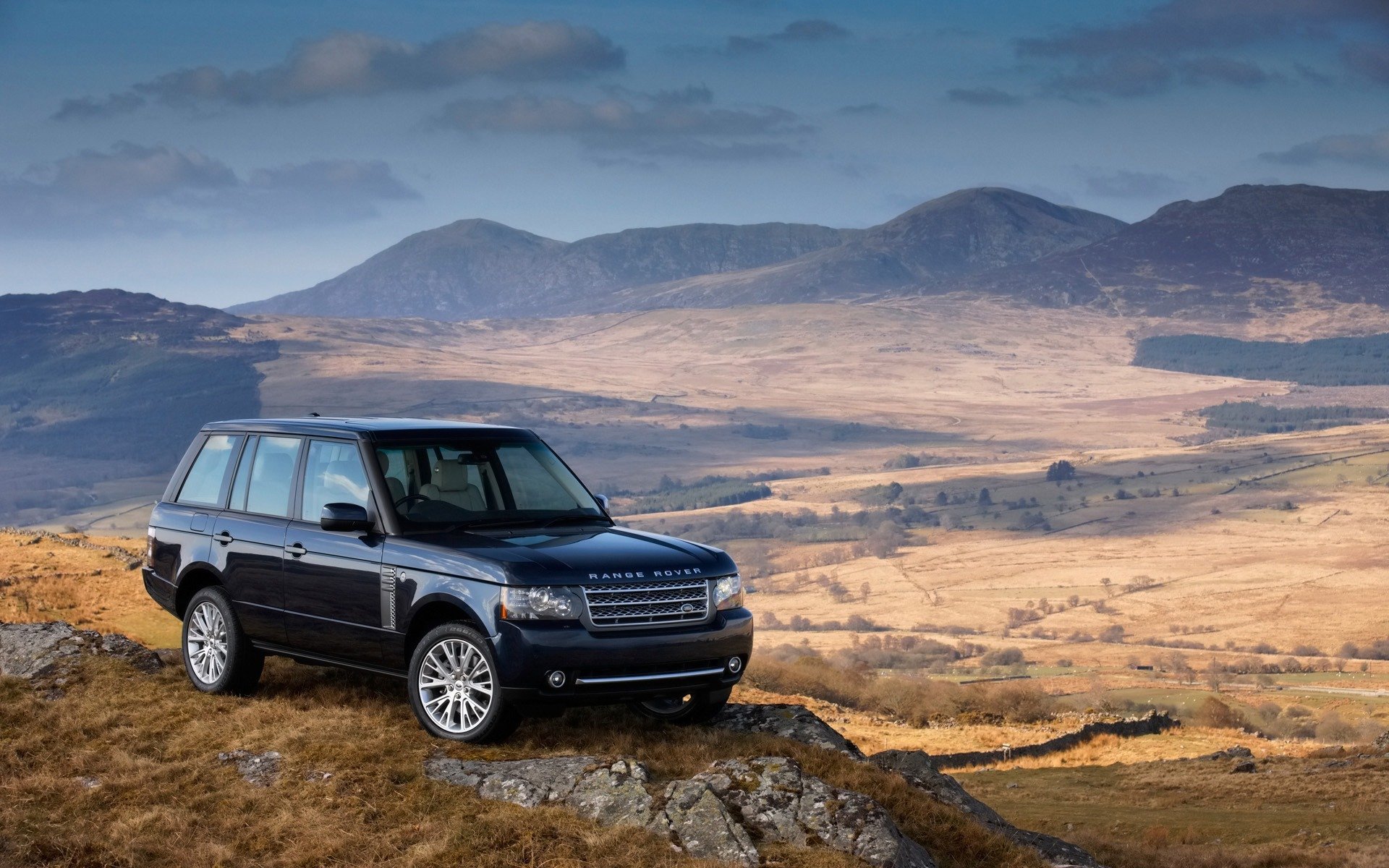 machinery cars landscape mountain rock tops hills sky range rover auto walls landscape slope