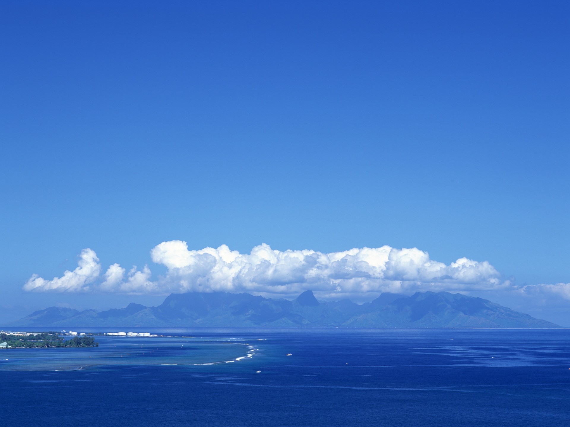 clouds mountain island sea