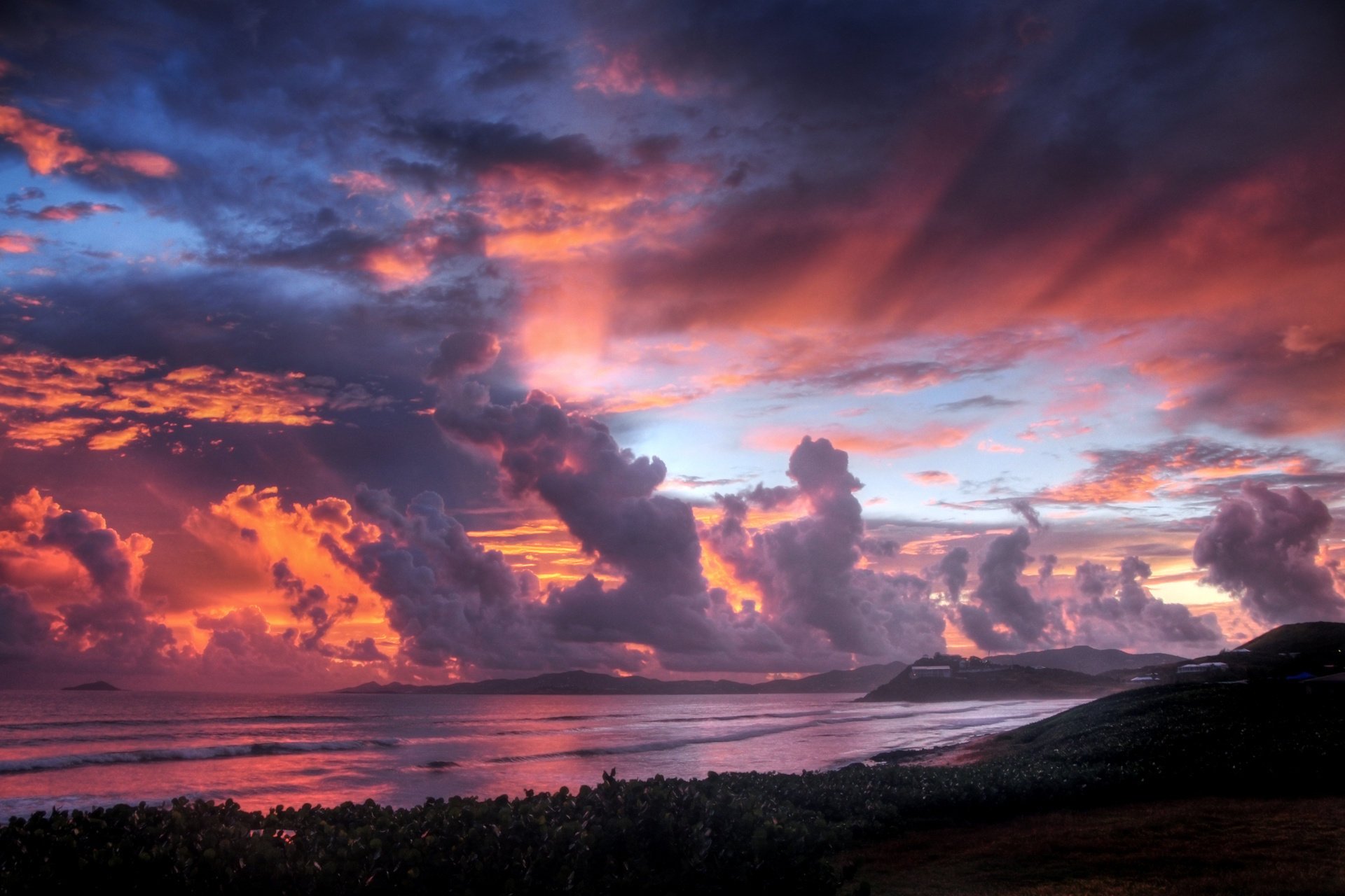 hore clouds paint the sky sunset sea