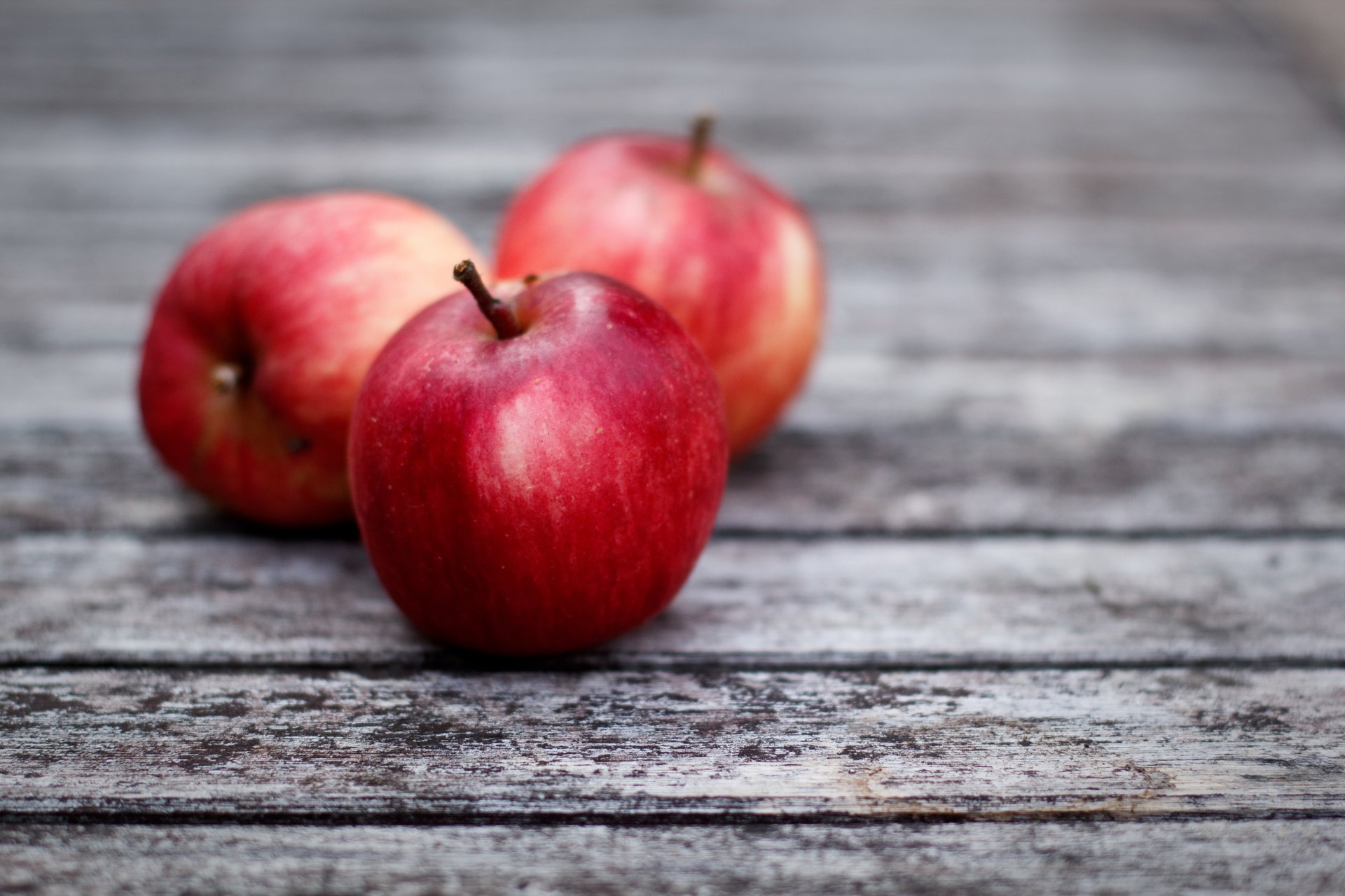 apples grey board red