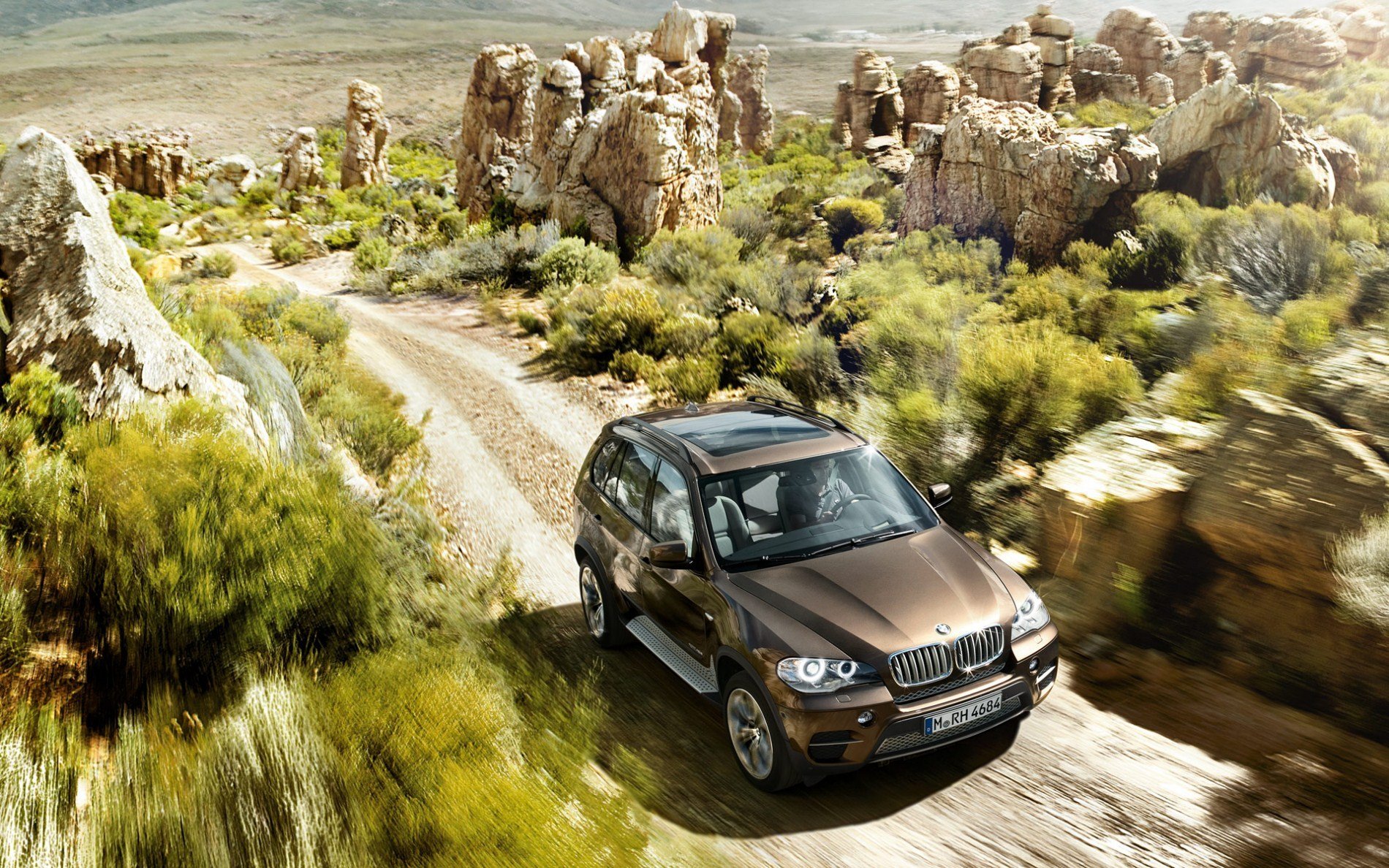 bmw auto straße steine felsbrocken