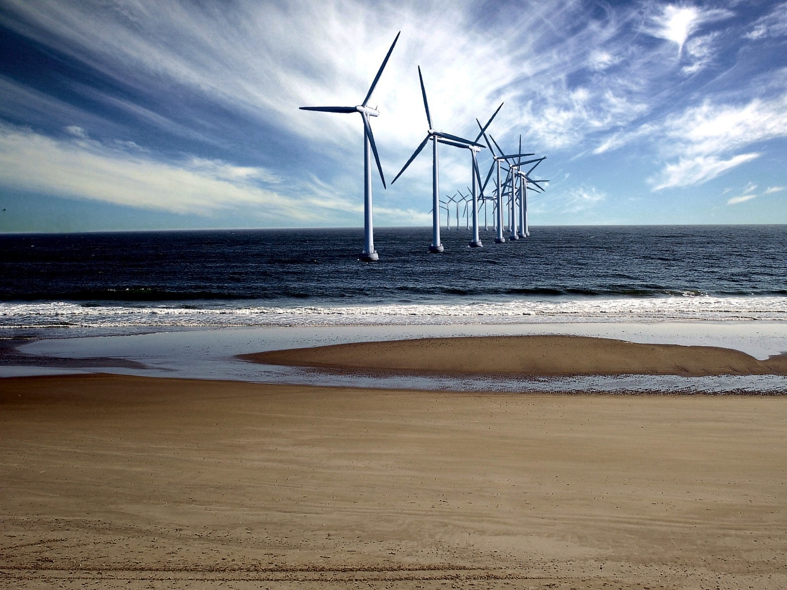 beach sea a windmill