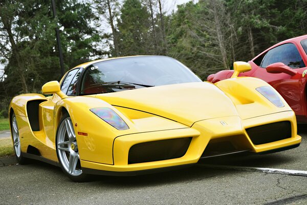 Enzo s yellow Ferrari in the parking lot
