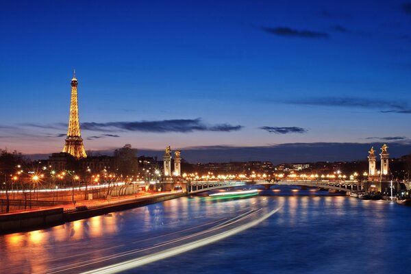 Evening city of Paris view from the river