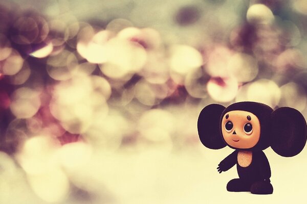 Juguete cheburashka macro disparo resplandor brillante